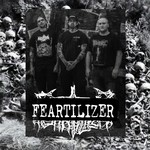 A grainy black and white photo shows three-piece Feartilizer 1492 standing against a dark brick wall with graffiti on it. Outside of the frame of the photo, skulls and bones can be seen in the background.