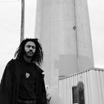 Black and white photo of solo musician Jairus Sharif
