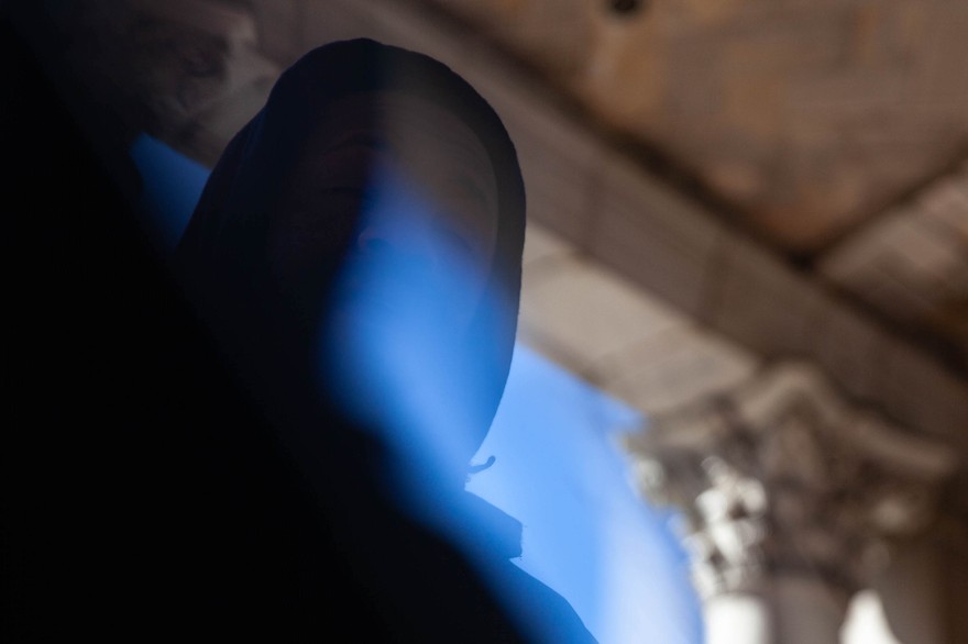 Hazy photo of rapper billy woods, shot from below.