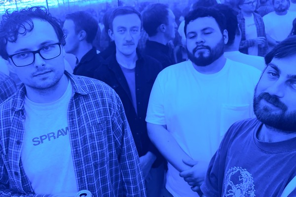 A photo bathed in blue light shows four-piece Horse Rider standing in a mirrored room and you can see various reflections of the band behind them. 