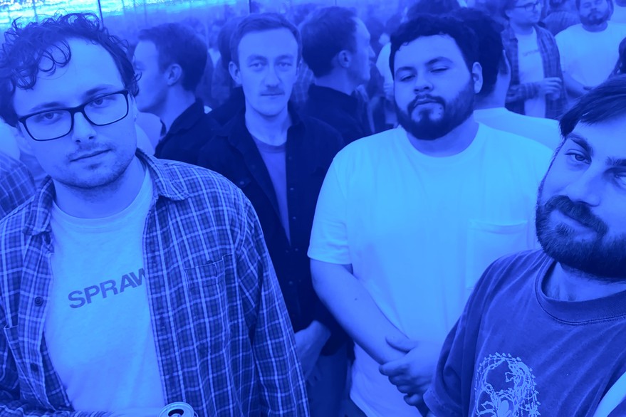 A photo bathed in blue light shows four-piece Horse Rider standing in a mirrored room and you can see various reflections of the band behind them. 