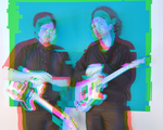 A colour photo with a distorted red and blue 3D type effect shows two members of the band Temps standing side by side wearing all black and both holding white guitars.