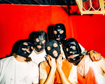 Five members of Tear Dungeon stand close together in front of a vivid red backdrop, each wearing a black mask that obscures most of their face. They’re dressed in casual shirts—some splattered or stained—and lit brightly against the intense background, creating a stark, unsettling group portrait.